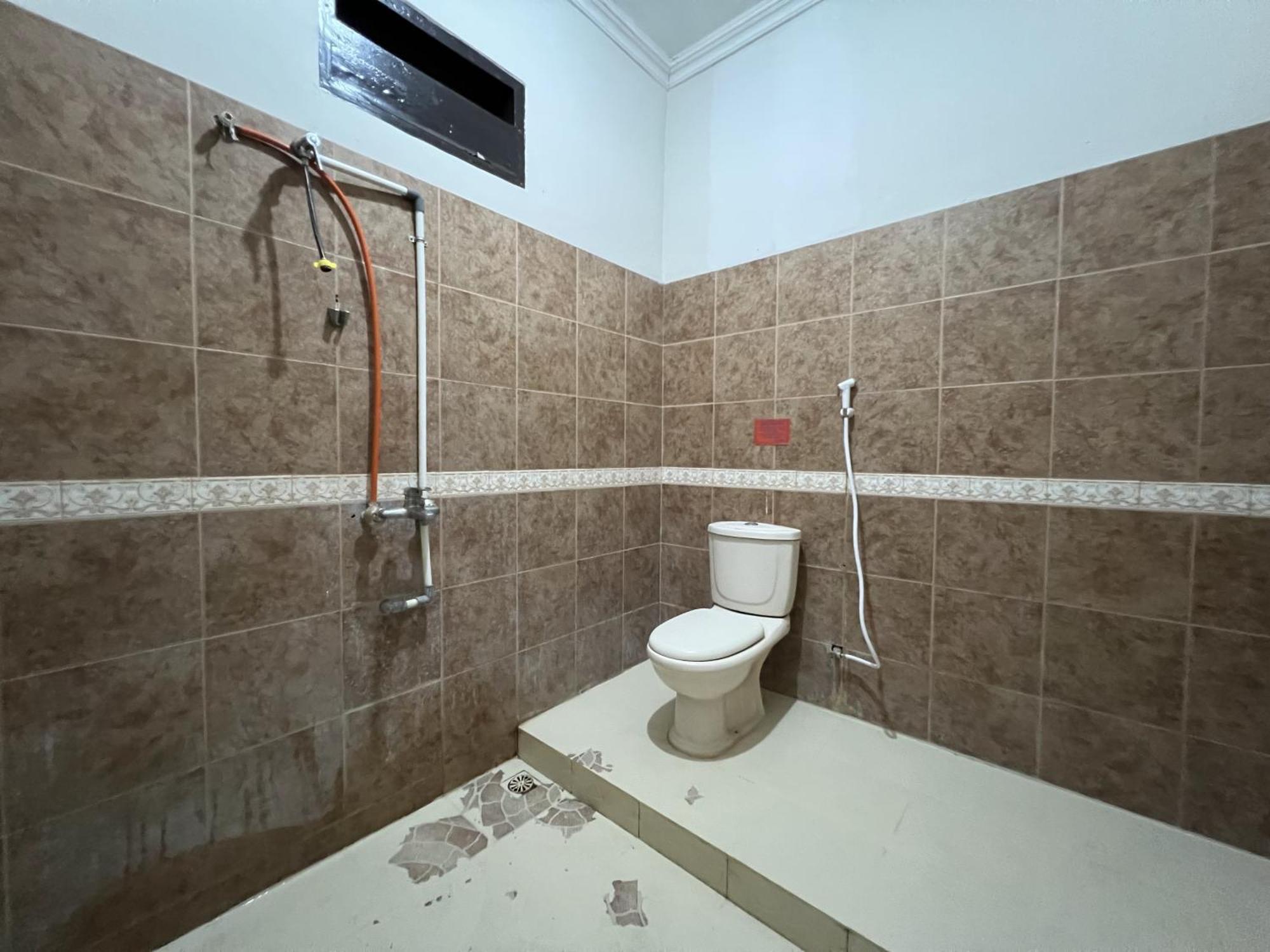 فندق Oyo 92098 Kost Orange Syariah ماكاسار المظهر الخارجي الصورة